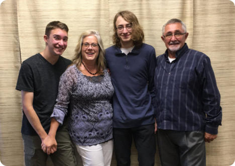 Pastor Larry Tenut, Beth Tenut, and Sons